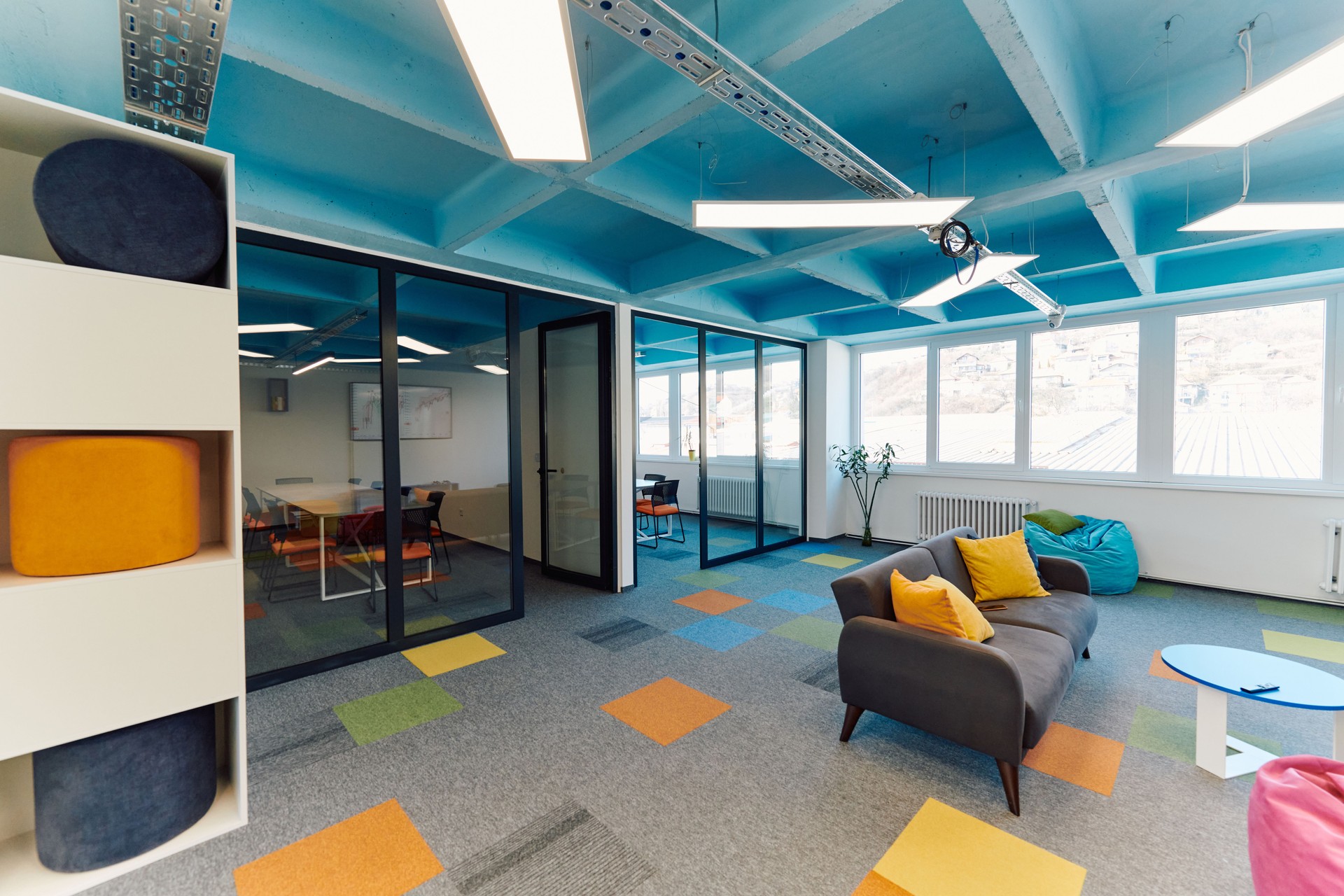Photo of a modern office where programming, digital marketing and web design projects are done. Office with modern furniture and glass office